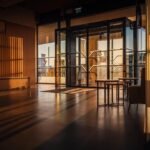 Intérieur moderne d'une salle d'attente avec lumière dorée et mobilier minimaliste