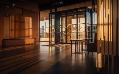 Intérieur moderne d'une salle d'attente avec lumière dorée et mobilier minimaliste